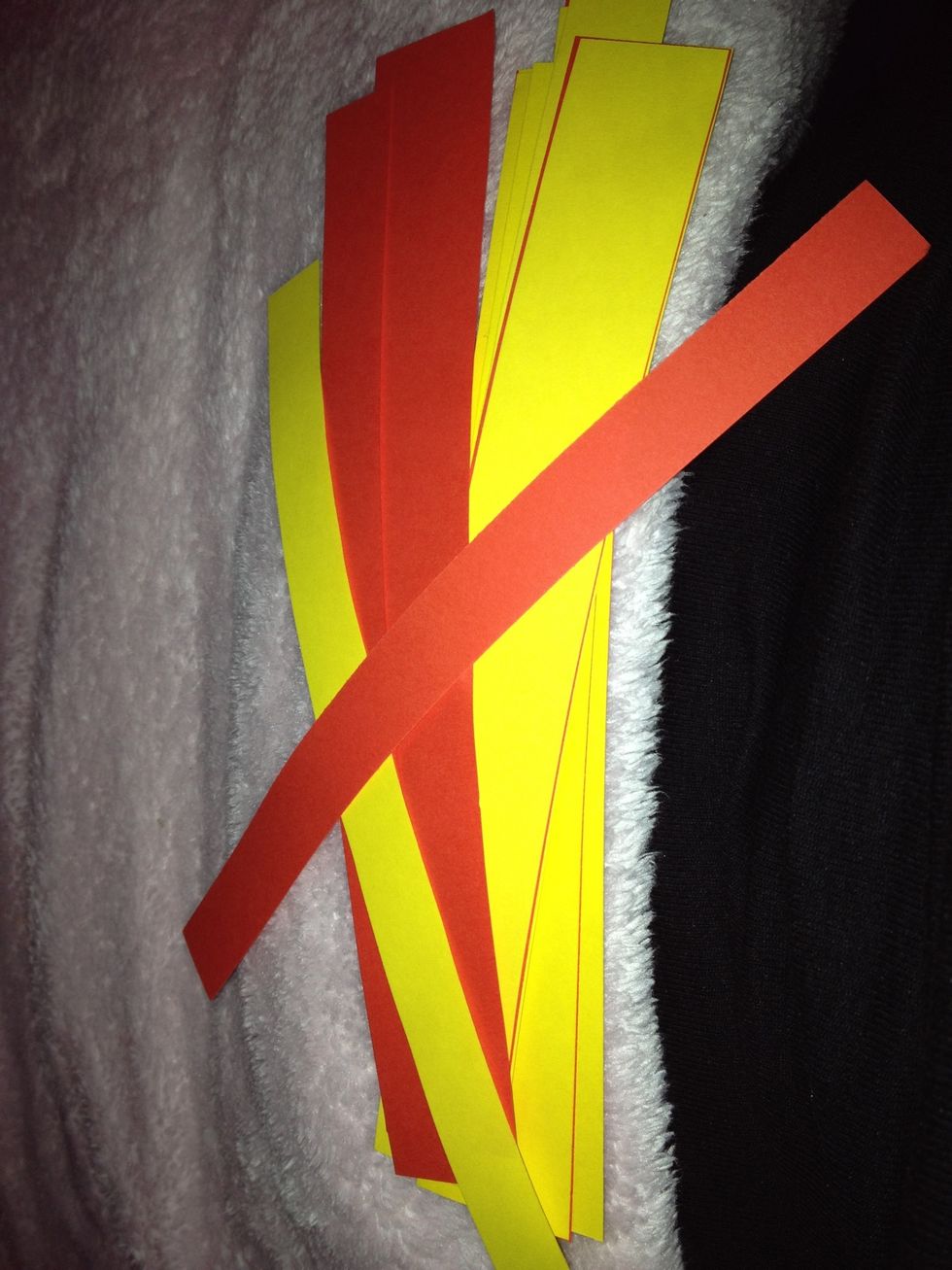 Cut paper into strips,