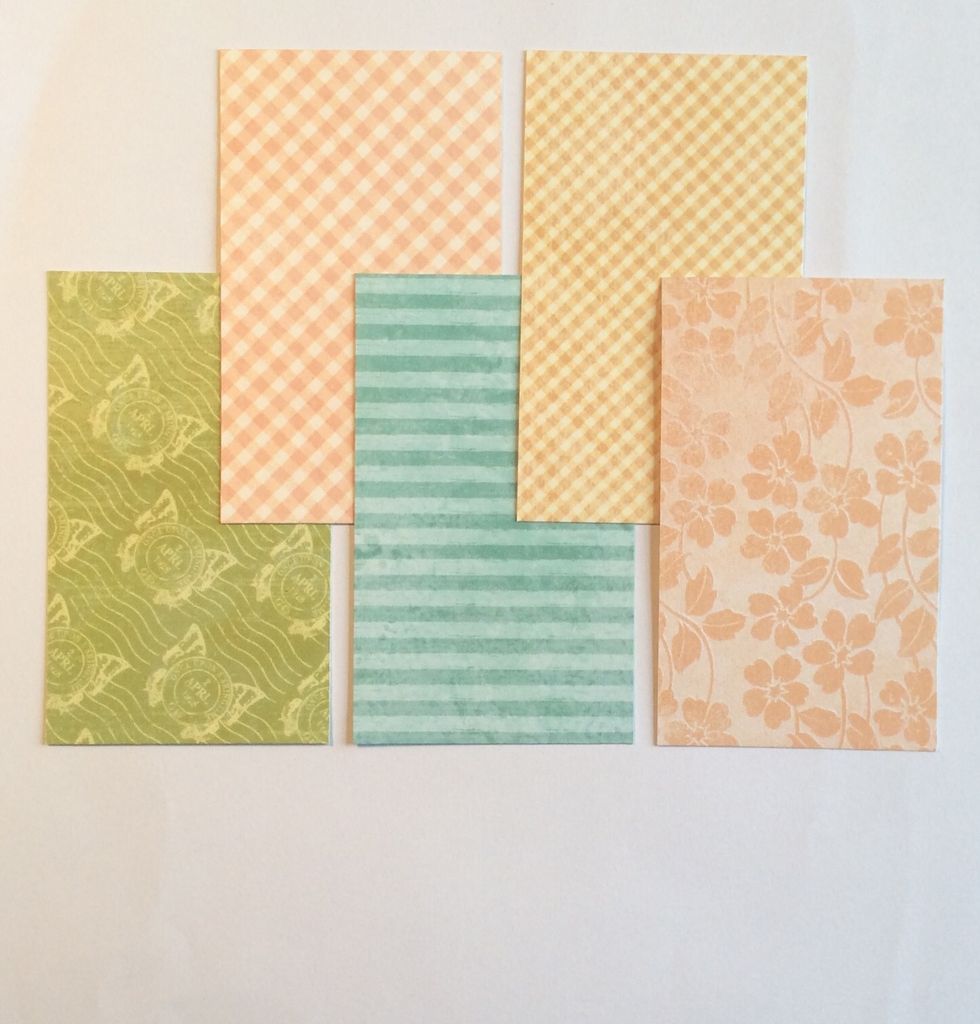 Cut paper mats for each side of the tubes. Each mat measures 3 3/4 x 2 1/4 inches. You will need ten mats if five tubes are used.