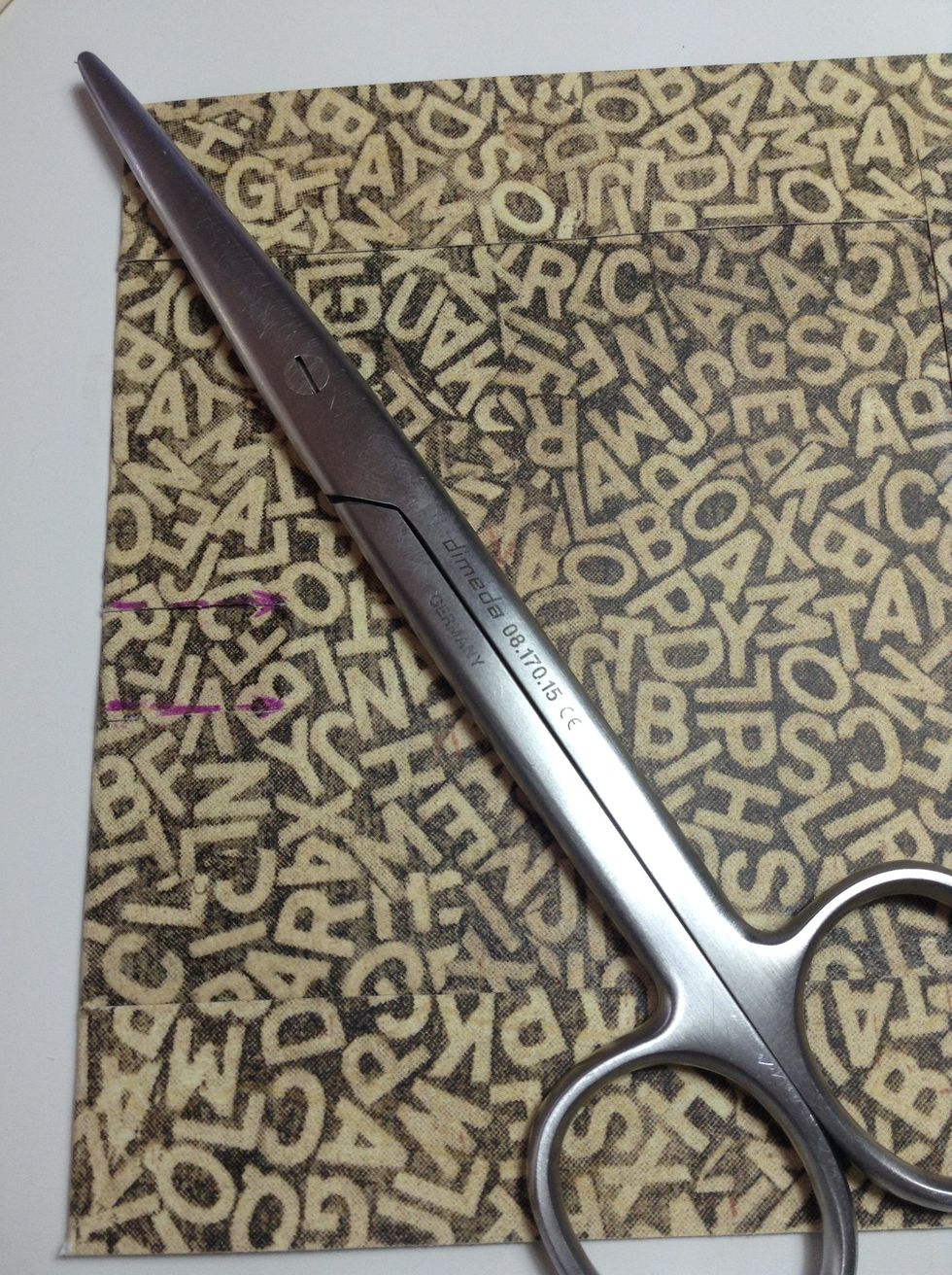 ...cut parallel slits from the folded edge, by the back  of decorated paper...