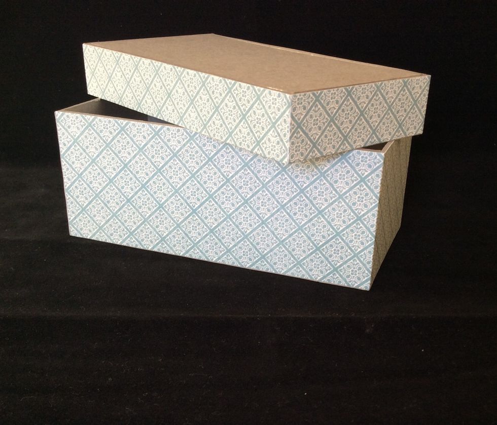 Cut pattern paper mat strips two at 1 x 12 inches and two at 2 1/2 x12 inches. Adhere to sides of lid and base two sides at a time and trim excess.
