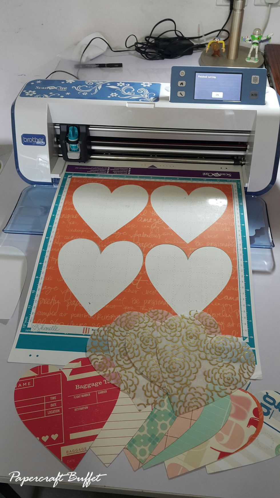Cut pattern paper with 5-1/2" heart shape using ScanNCut or print a template to help.