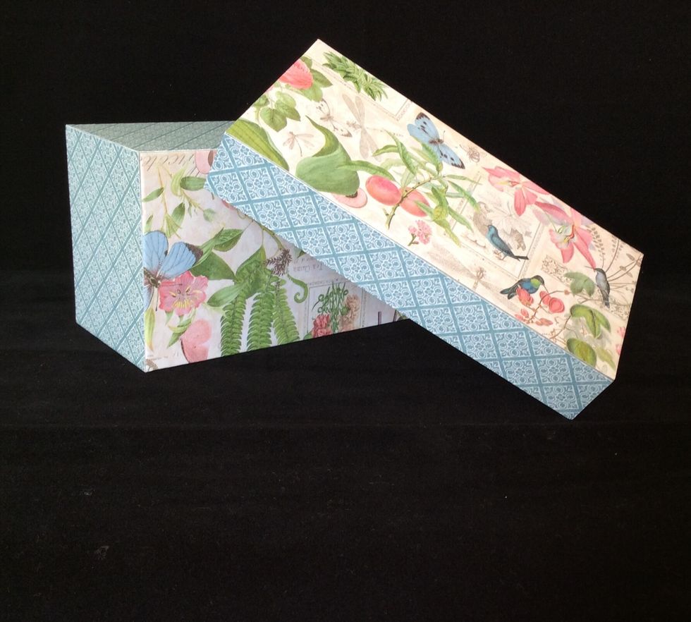 Cut patterned paper mats for the top and bottom at 6 1/4 x 3 1/4 inches. Trim if necessary. Adhere to top and bottom using scor tape.