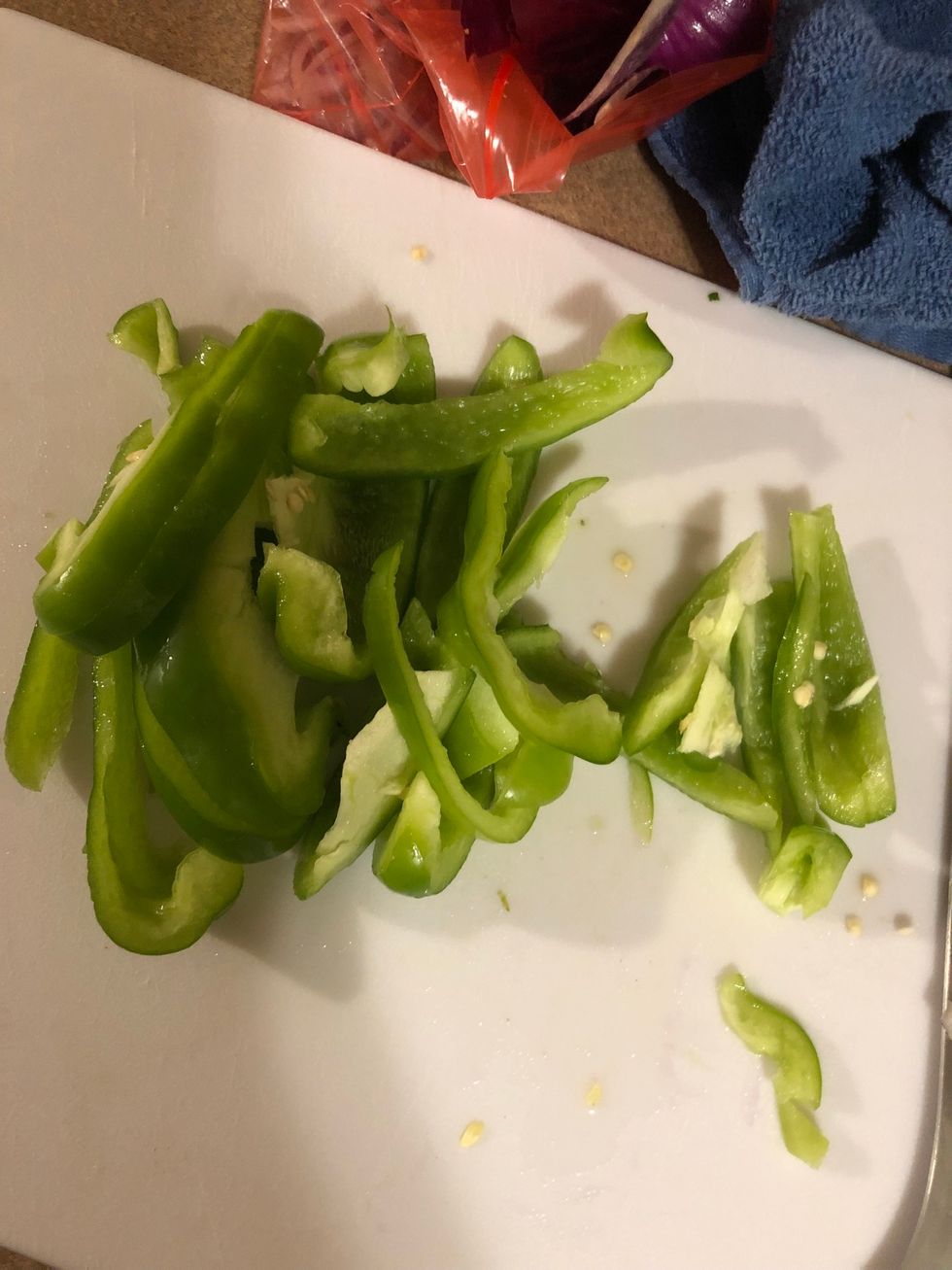 Cut pepper into strips