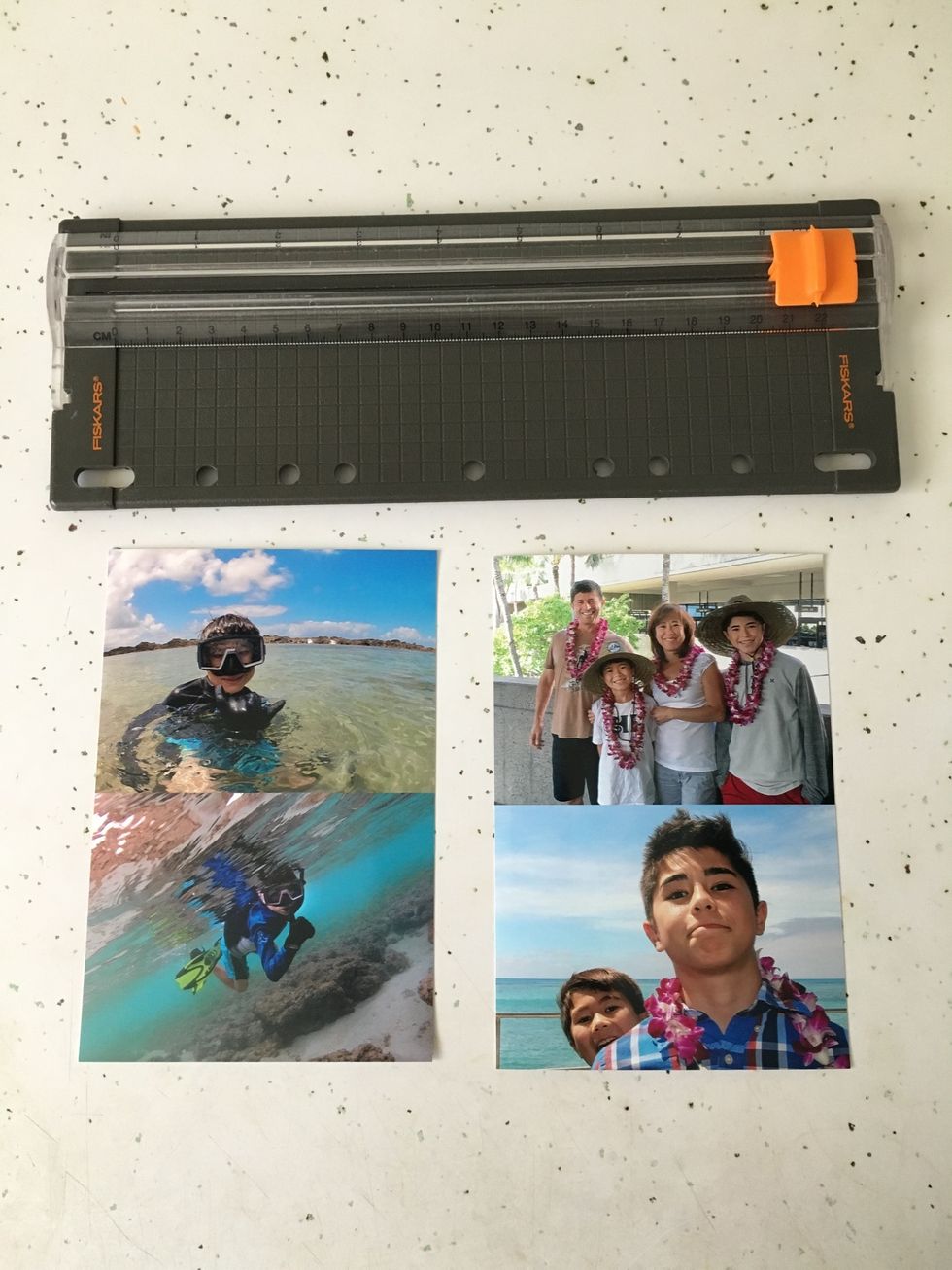 Cut photos using paper cutter. I sized the prints to 3x4 using a photo editing program. I was able to fit two images on each 4x6 paper at the print shop.