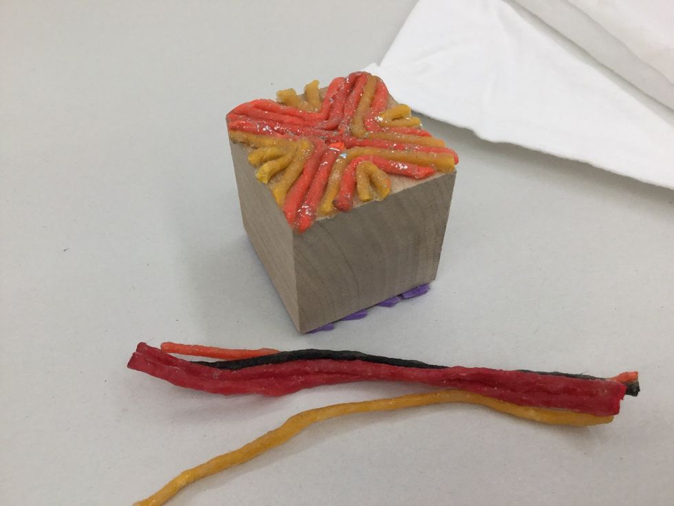 Cut pieces of wikki stix for the other side of the block. Don't overlap pieces - they won't print nicely.