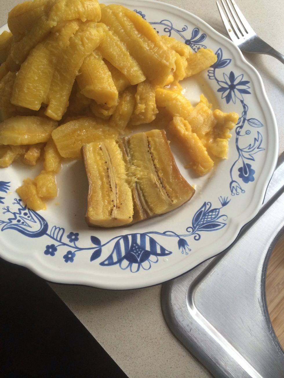 Cut plantain in half, and remove the seed stem. Thereafter, remove the skin