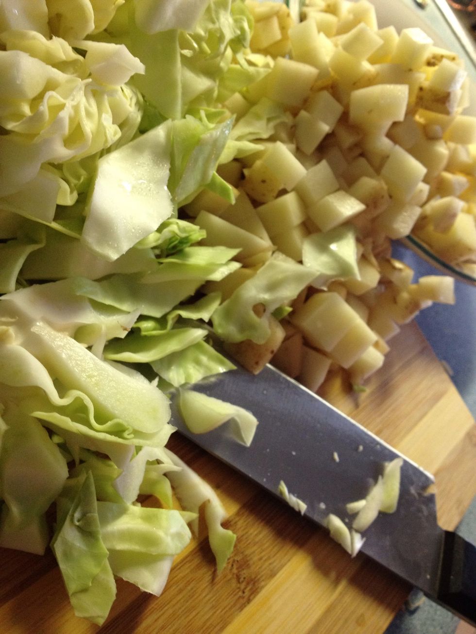 -Cut potatoes in small cube -Cut cabbage in small pieces