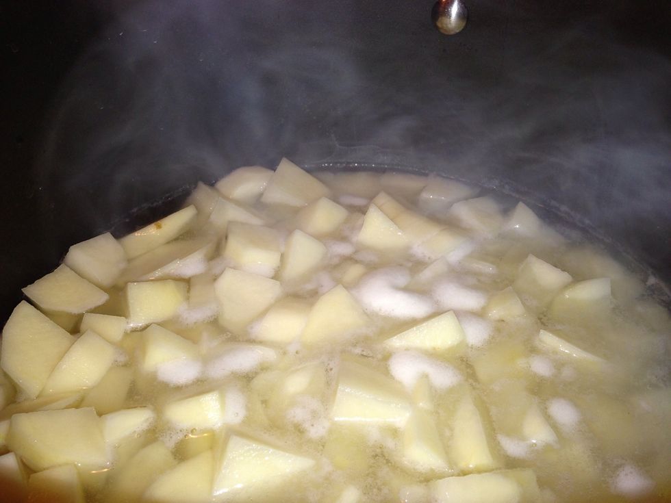Cut potatoes into bite sized pieces. Fill pan with water until potatoes are just barely covered.