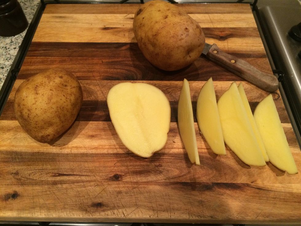 Cut potatoes into wedges