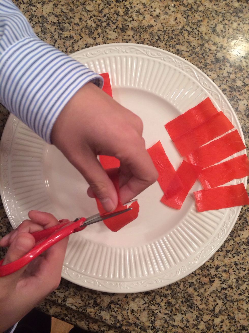 Cut remaining Fruit Rollups into 2-3 inch strips.