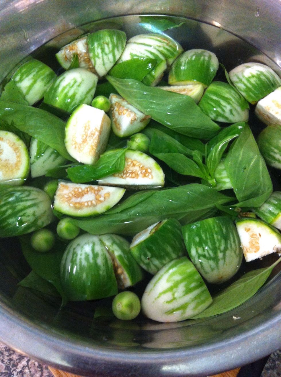 Cut round eggplants to small pieces