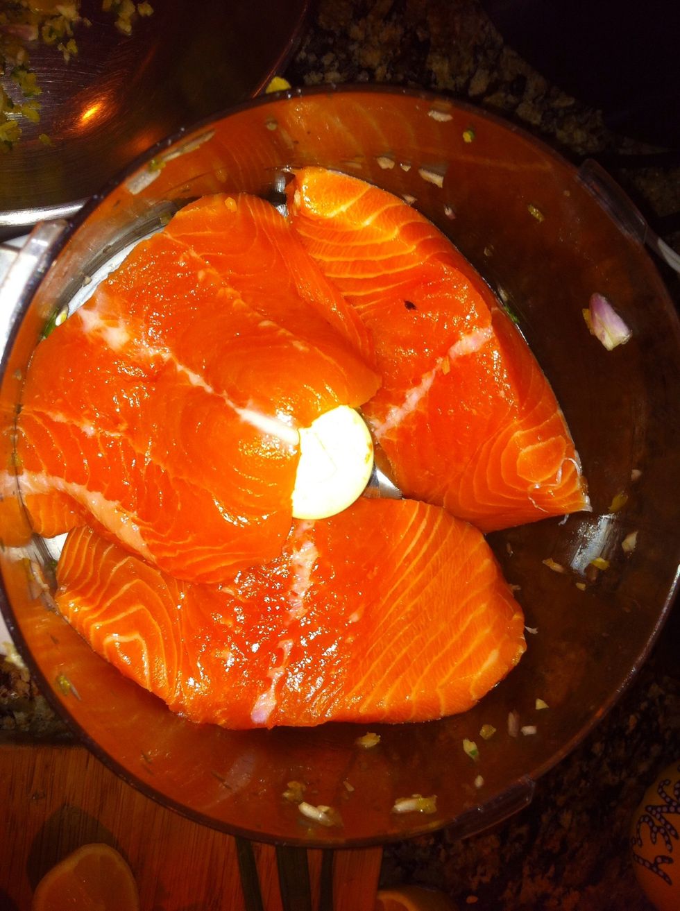 Cut salmon into pieces and pulse about 15 to 20 times.