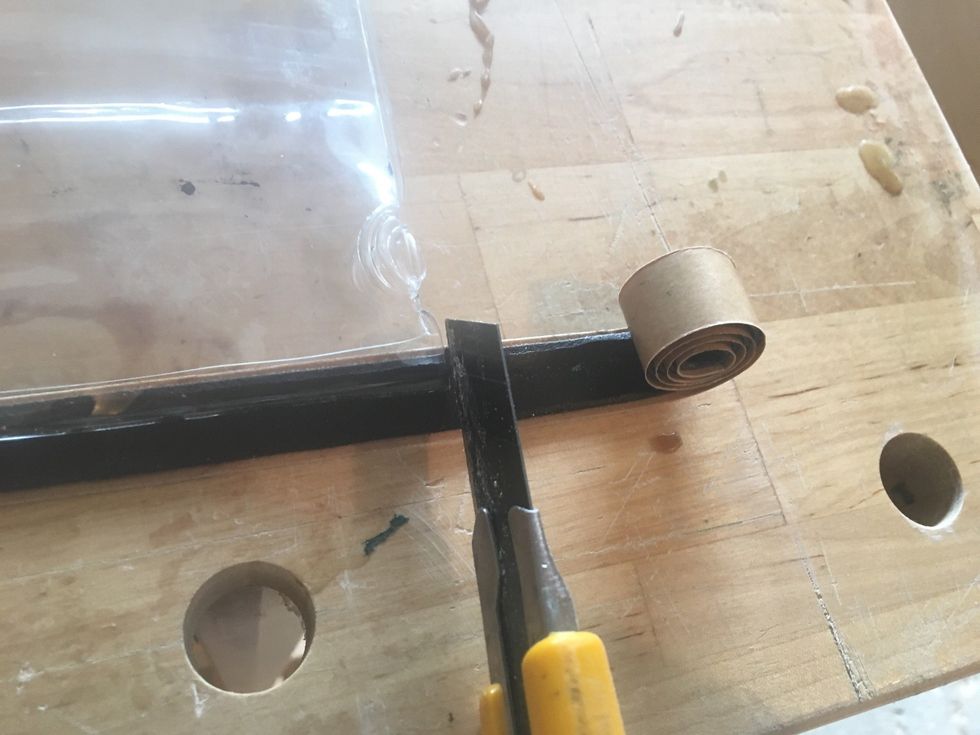 Cut Sealing Tape with a Utility Knife.