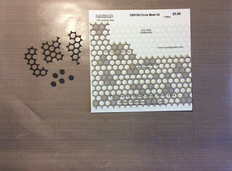 Cut sections from the Scrapmatts pack CB5129 and ink with black ink. I used distress ink black soot.