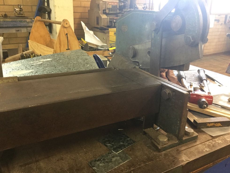 Cut sheet metal on the line you marked with the scribe