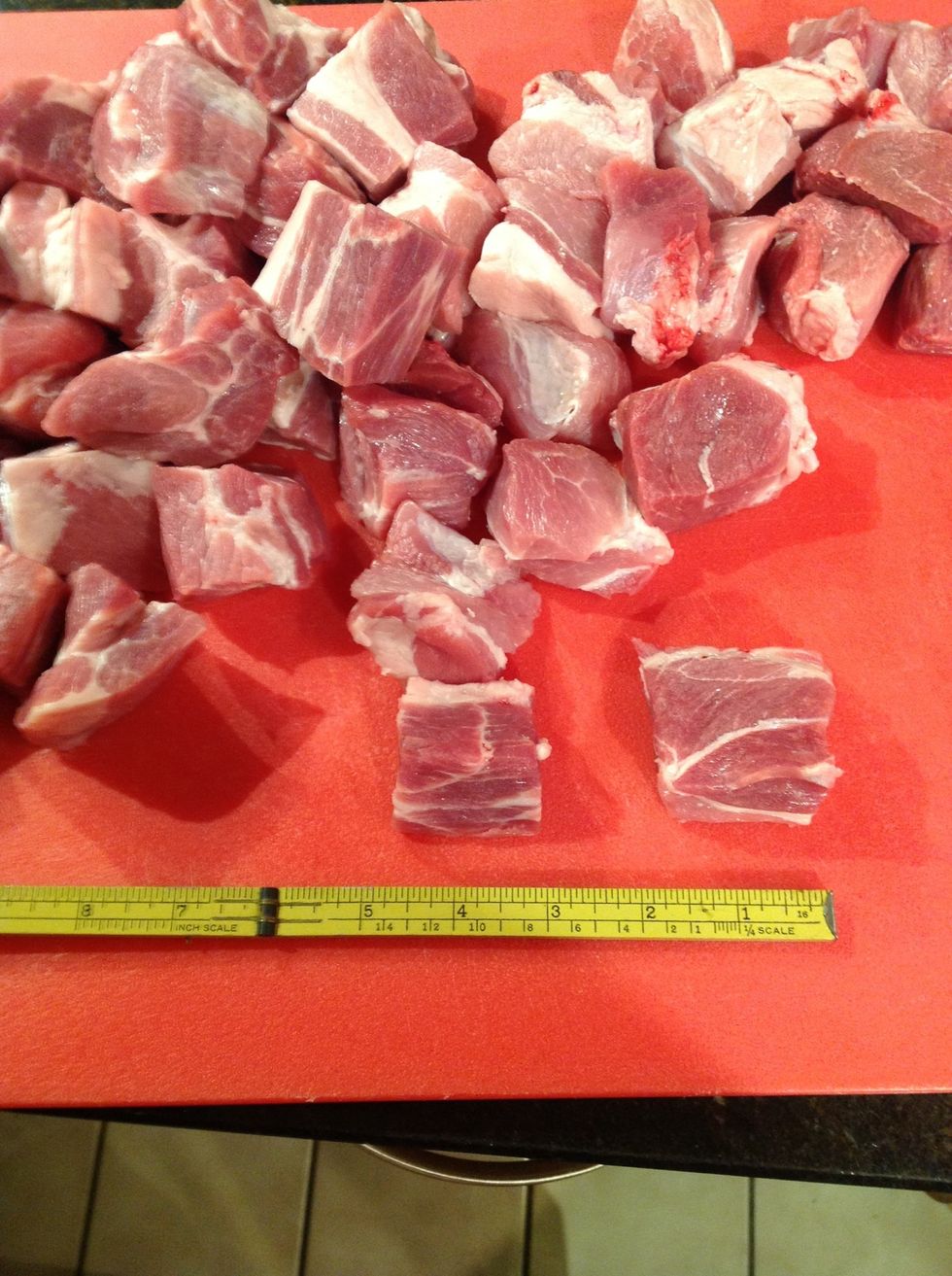 Cut shoulder roast into cubes 1 to 1 1/2" square. Heat olive oil and beef fat in 7.5L casserole/stew pot.