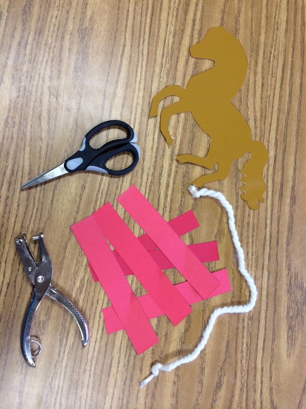 Cut six paper strips per lantern.