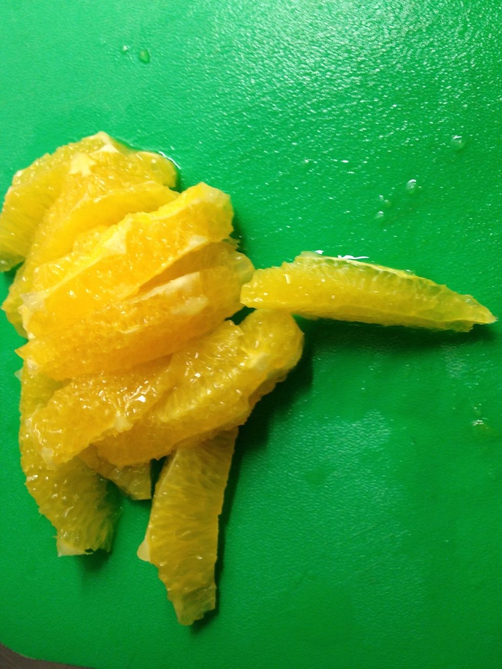 ...cut/slice an orange, without getting any of the white nasty stuff on it (how to do it is a separate guide that will be uploaded very soon). Save the juice. It will be added at a later stage.