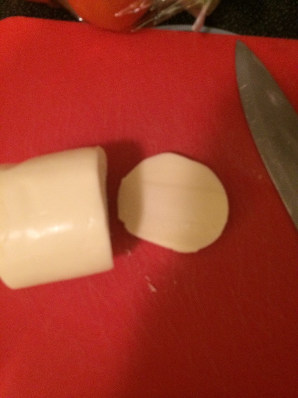 Cut slices of mozzarella ball