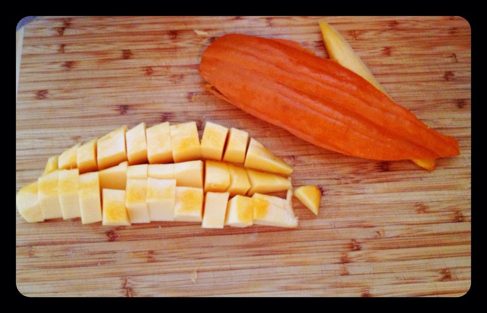 Cut slices out of the pumpkin. Separate the ribs and pulp. Cube the pulp. (Pulp is the meat, and the ribs are the outside or skin of the pumpkin)