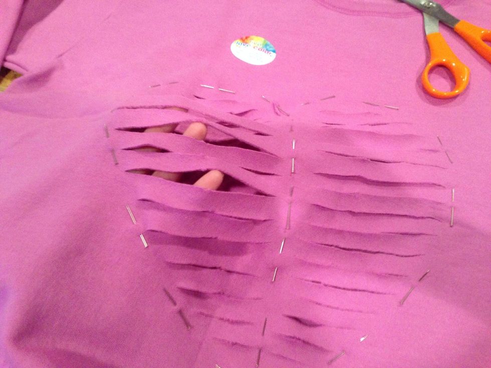 Cut slits between the pins. The longer the slits, the more drape you'll get.