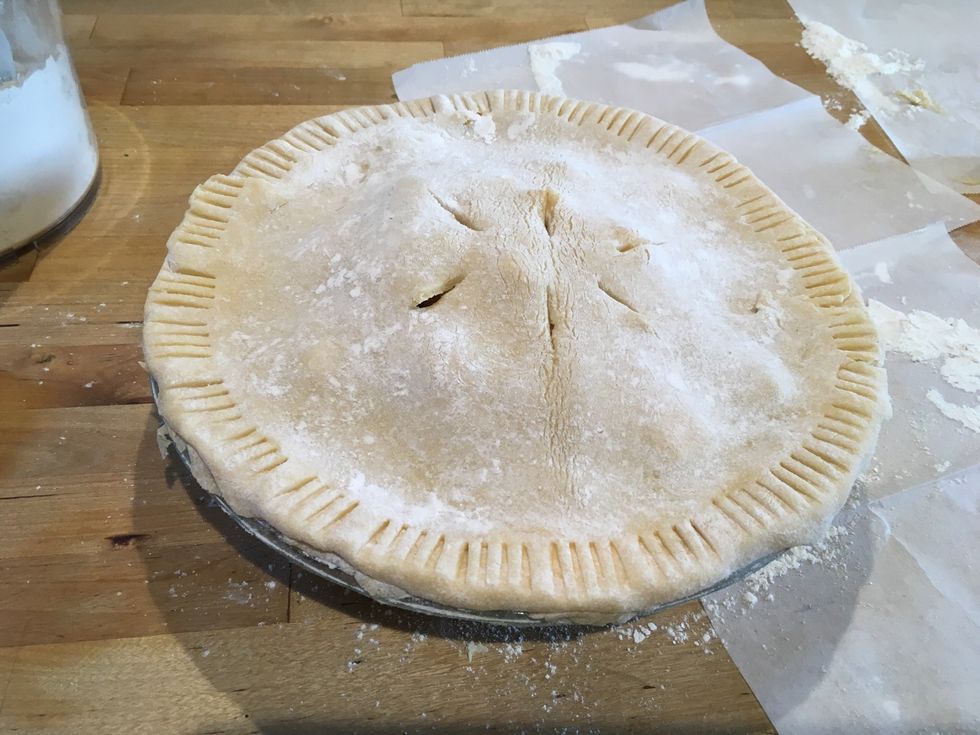 Cut slits in the middle for the extra air to come out. OPTIONAL: use the 4 spikes of the fork to gently make little lines on the edge of the pie.