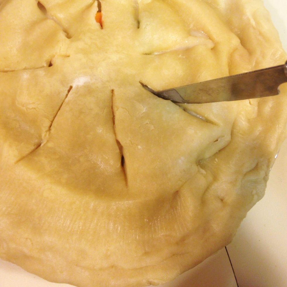 Cut slits into top pie crust to let steam out while cooking.
