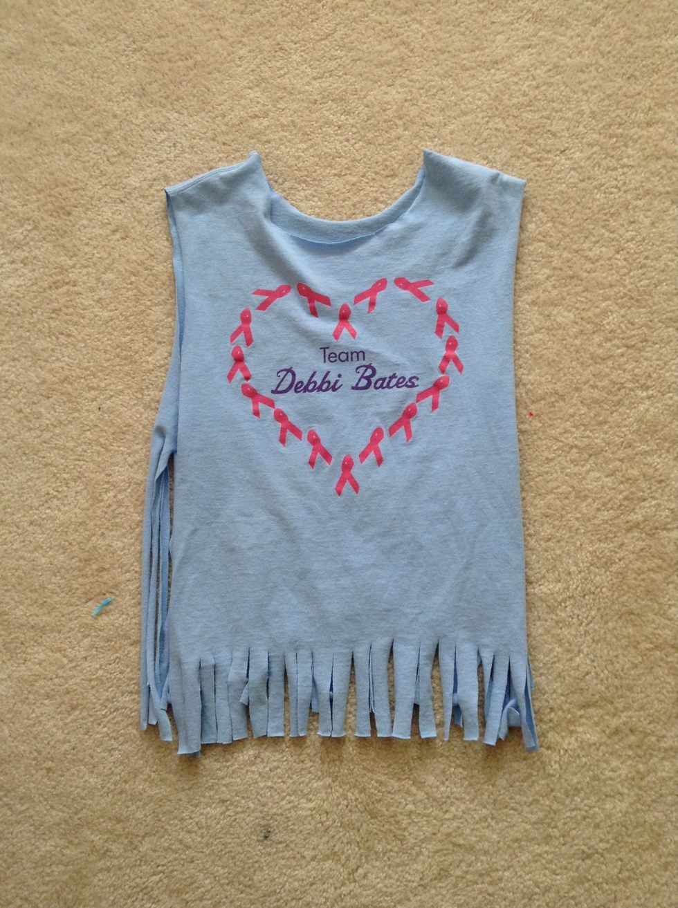 cut smaller strips on the bottom of the front, and this is what the finished shirt looks like (: