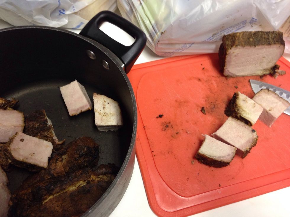 Cut smoke pork into 2 inch pieces.
