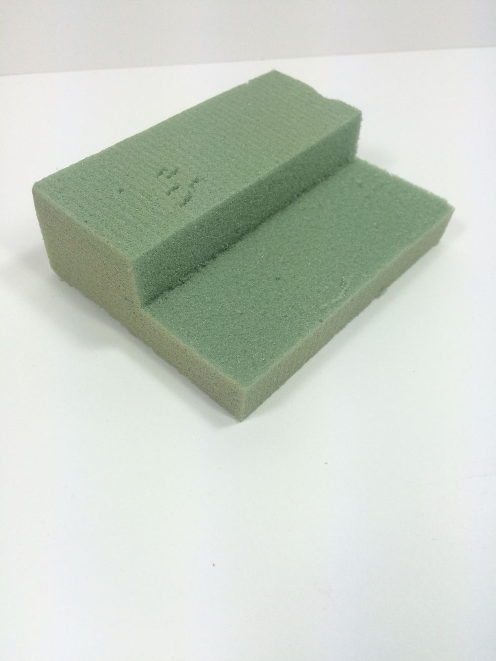 Cut some floral foam to fit in the box. I stair-stepped mine for different heights and dimension.