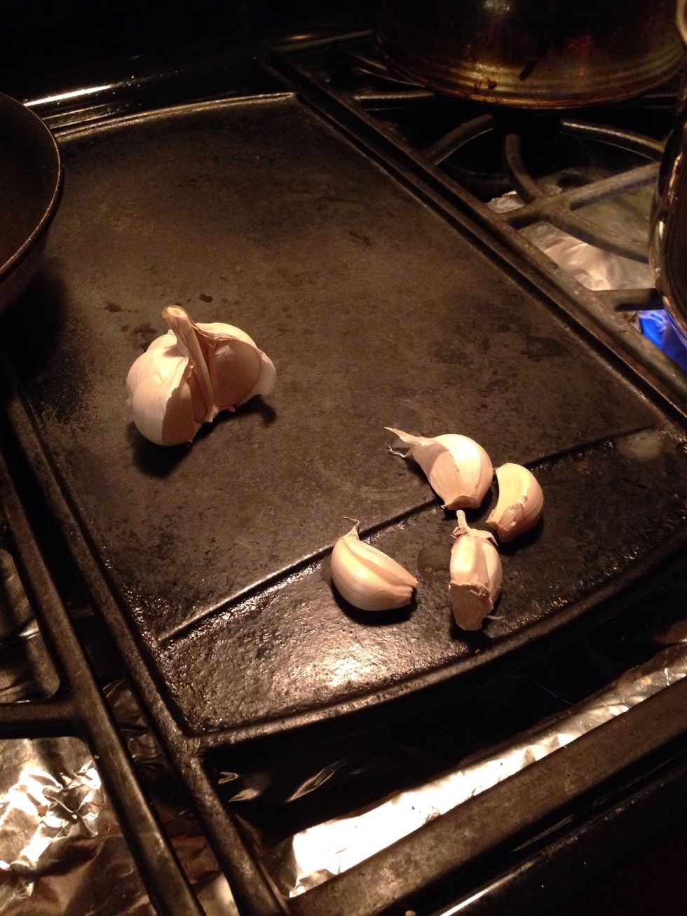 Cut some garlic and put a couple of them in the pot