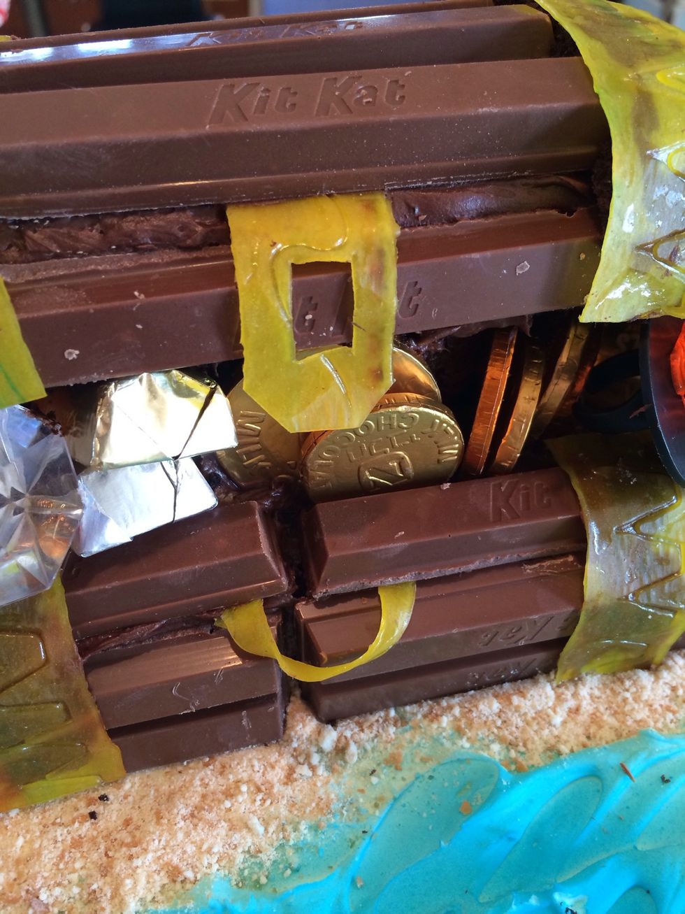 Cut some latch/lock pieces out of the Fruit by the Foot. You look famished...you really should eat the scraps. Do it for the children!