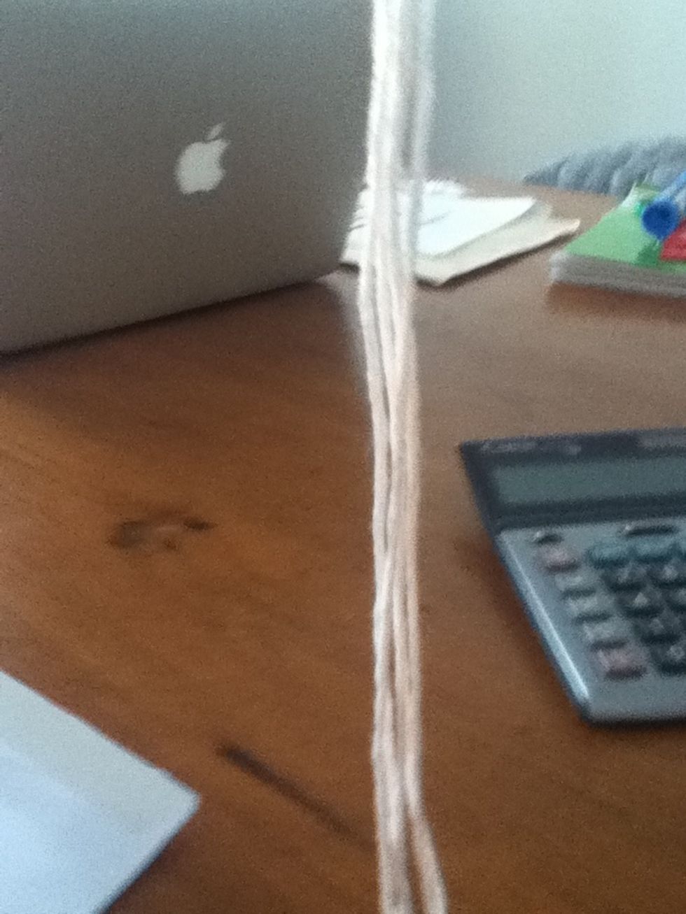 Cut some lengths of embroidery floss (Make it more than double to length of your wrist)