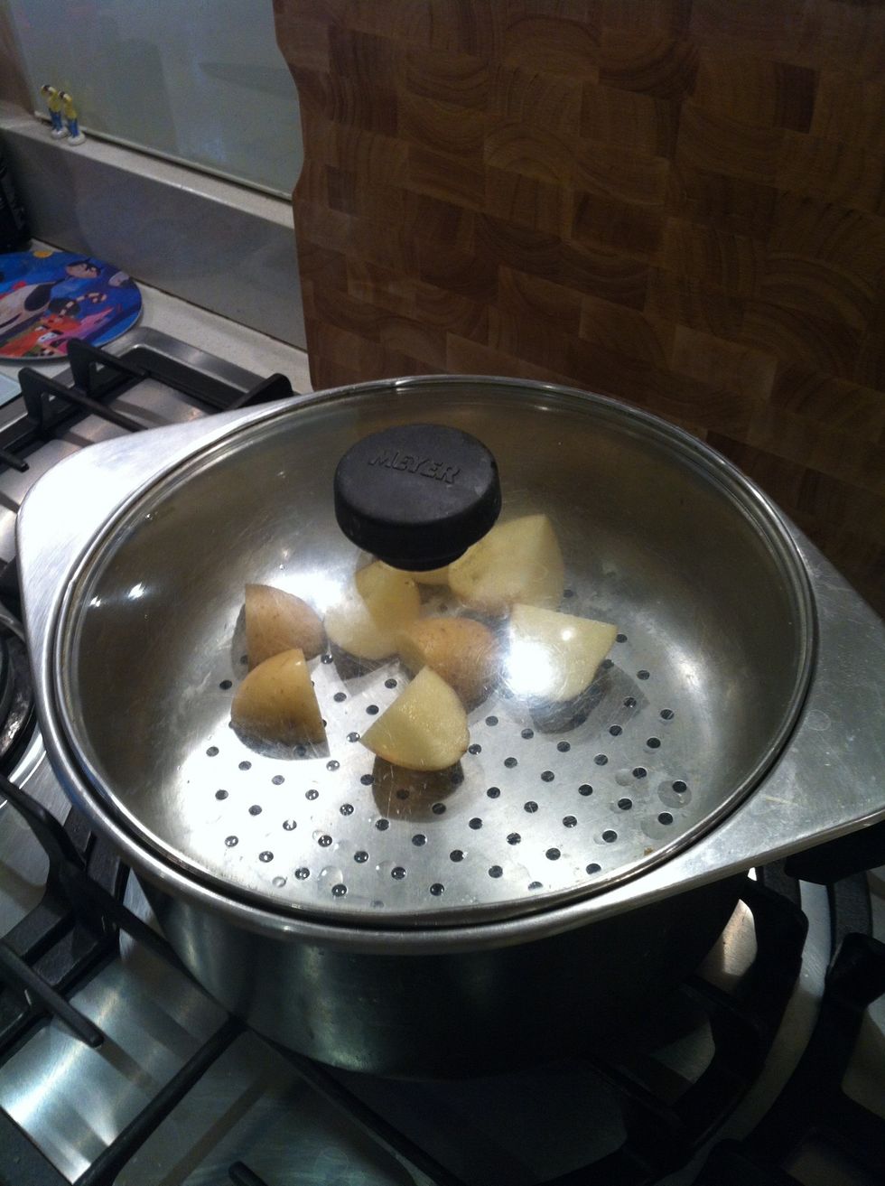 Cut some potatoes into smaller pieces (you can peel them if you want) and leave in the pan for 10 minutes
