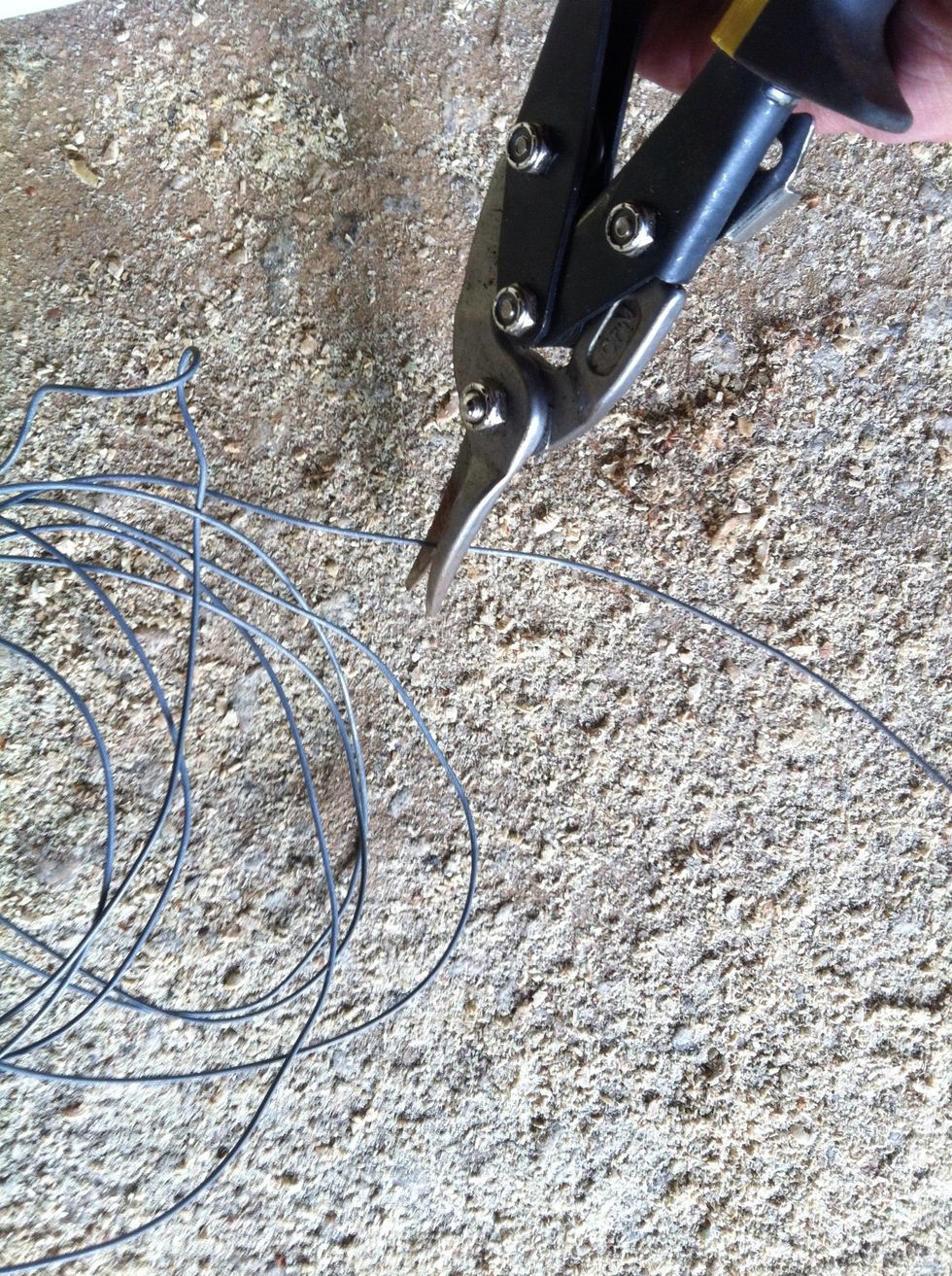 Cut some wire to secure the tubes together at the top of the arc.