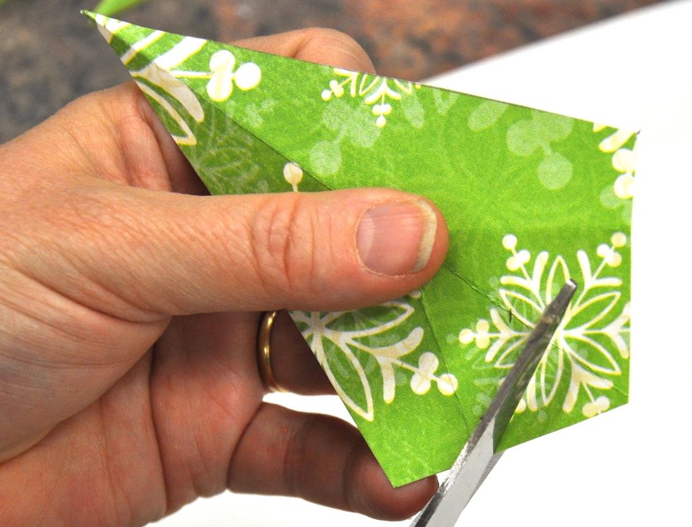 Cut straight across between the two bottom fold lines.