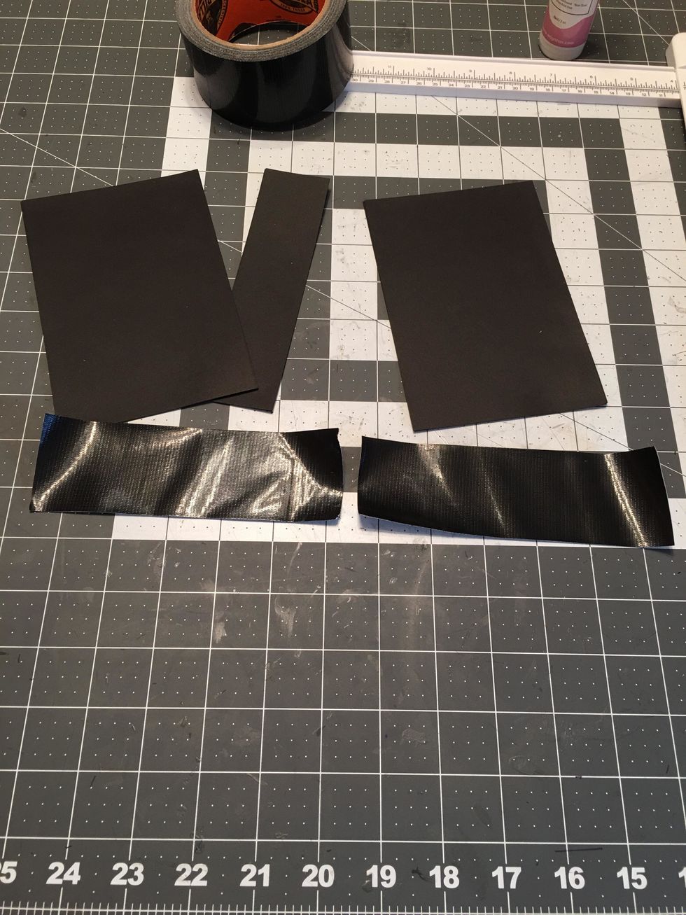 Cut strips of black tape (Duck tape or Gaffer's tape)