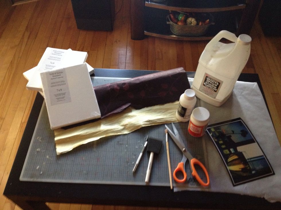 Cut strips of scrapbook paper to fit each side of the canvas. Apply mod podge liberally and glue strips on each side.