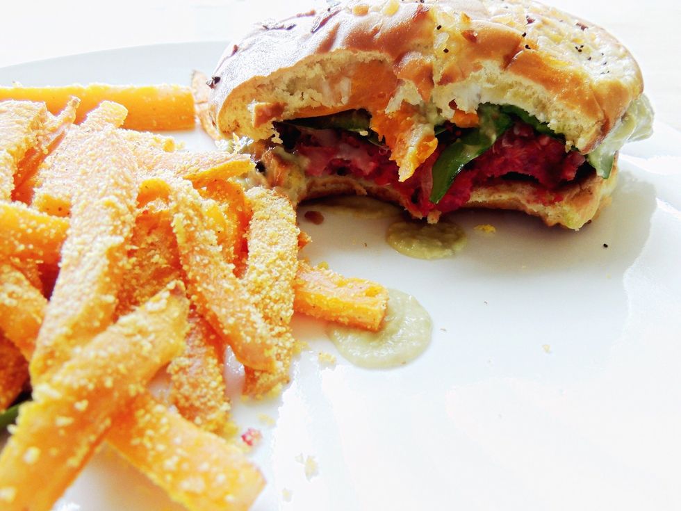 Cut sweet potatoes in strips for fries. Toss in additional coconut oil. Add rosemary for a kick; a pinch. Bake alongside burgers until they are the consistency you enjoy 30-45 minutes. Salt to taste.