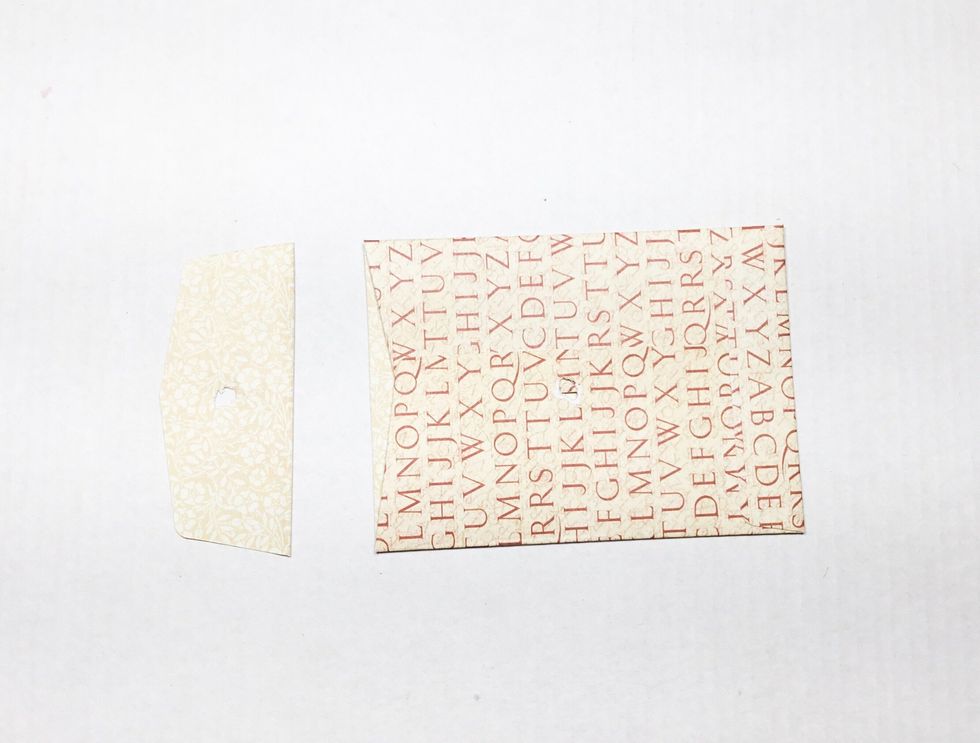 Cut tab off of one envelope as shown. This will be your back page.