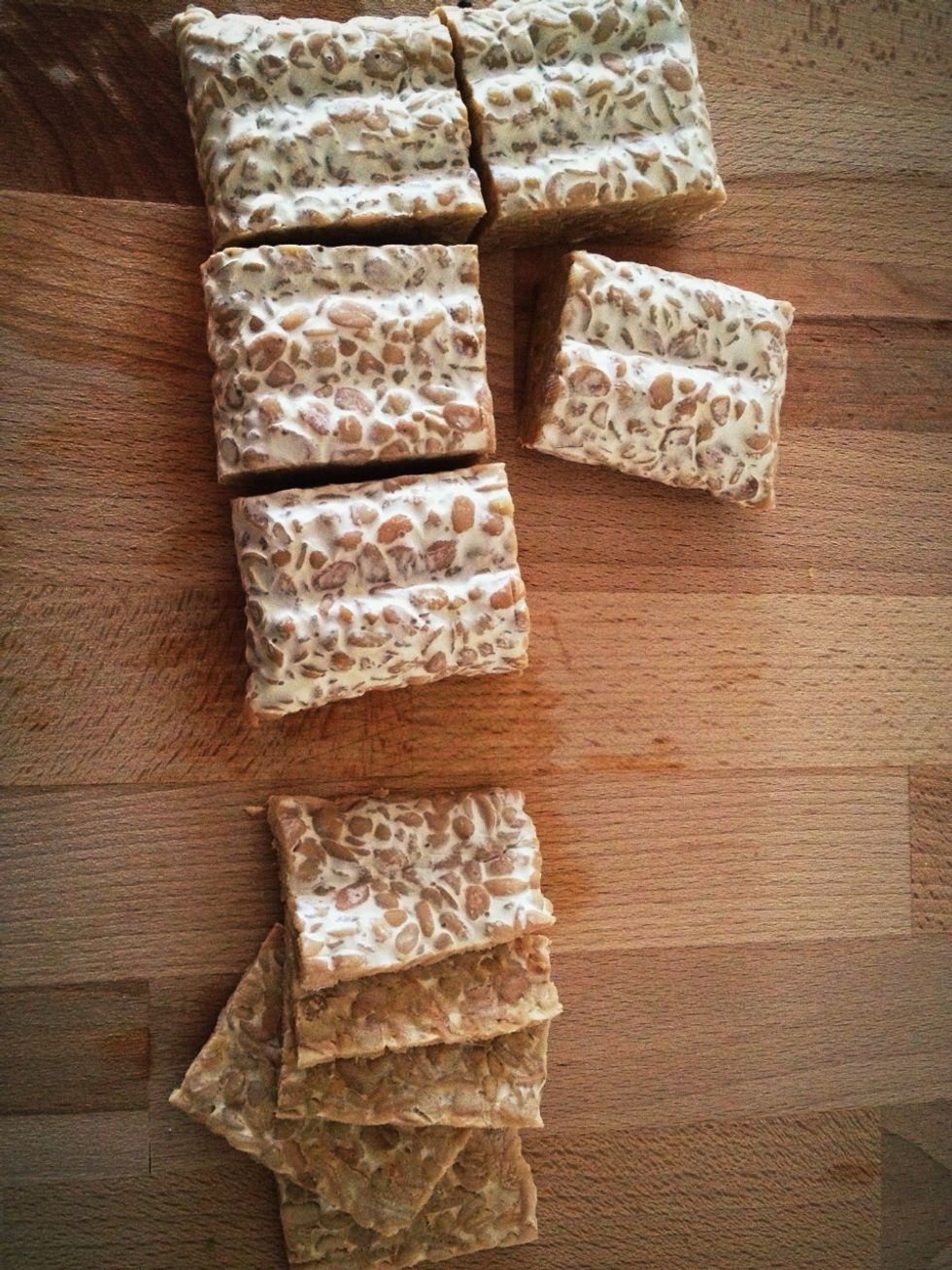 Cut tempeh in 6 squares and then finely cut