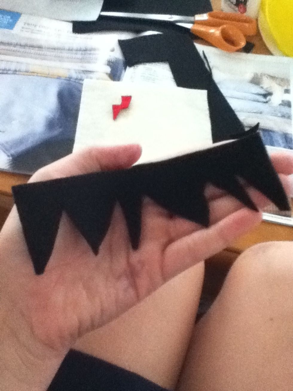 Cut that felt so it takes form of hair.