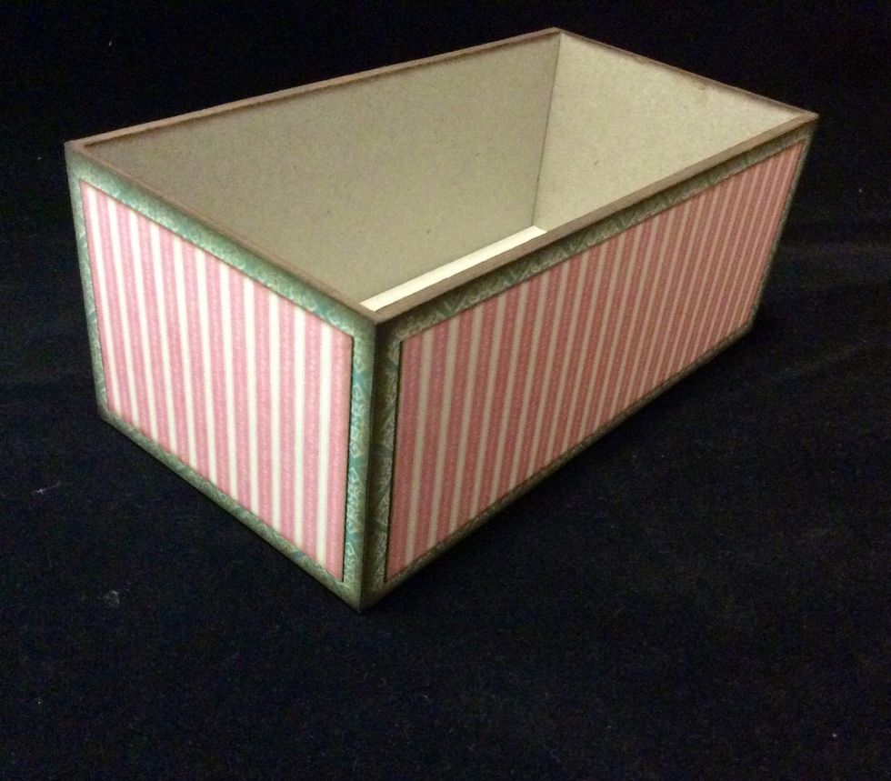 Cut the 2nd layer mats for the base at 2 1/8 x 5 3/4 and 2 1/8 x 2 7/8, 2 of each size. Slightly ink the edges to disguise the paper core and adhere to the base sides.