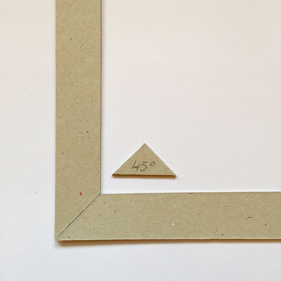 Cut the angle to form the corner.