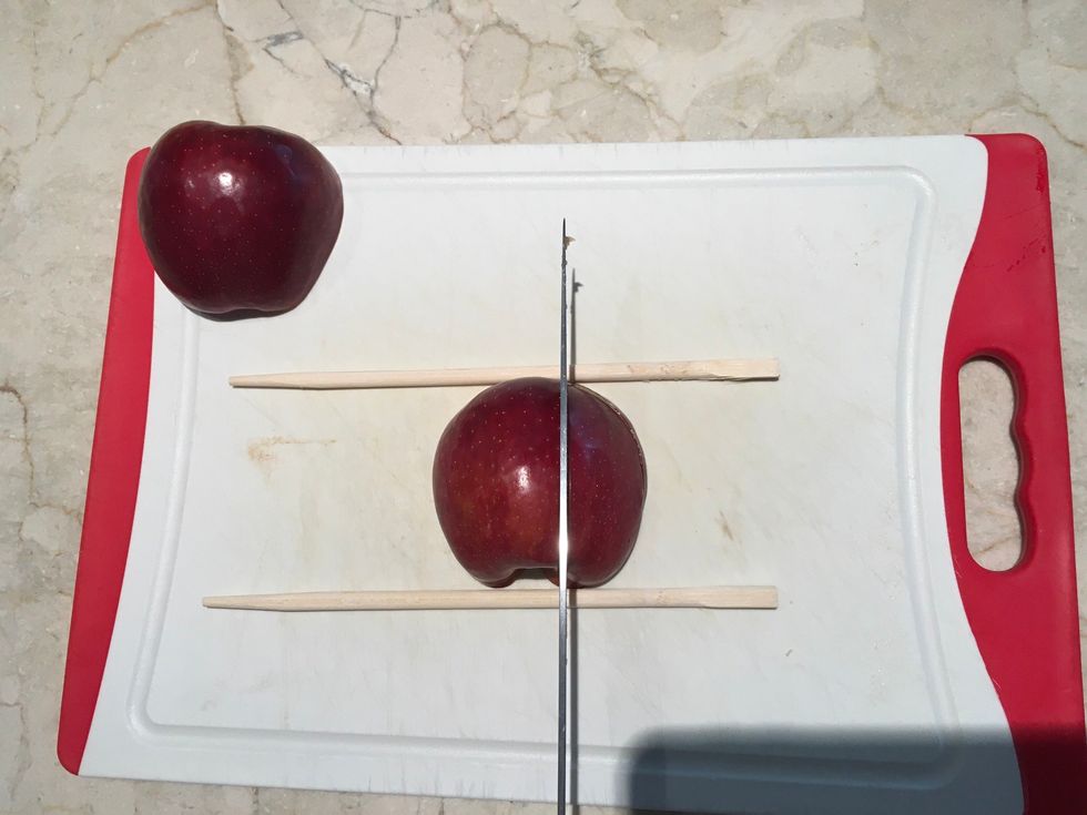 Cut the apple like in the photo to make the wing and don't cut all the way down