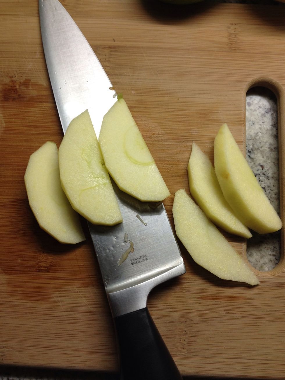 Cut the apples into quarters and cut the quarters into quarters so that your pieces are pretty thinly sliced. (So that they get evenly cooked. If your slices are thick - no big deal!)