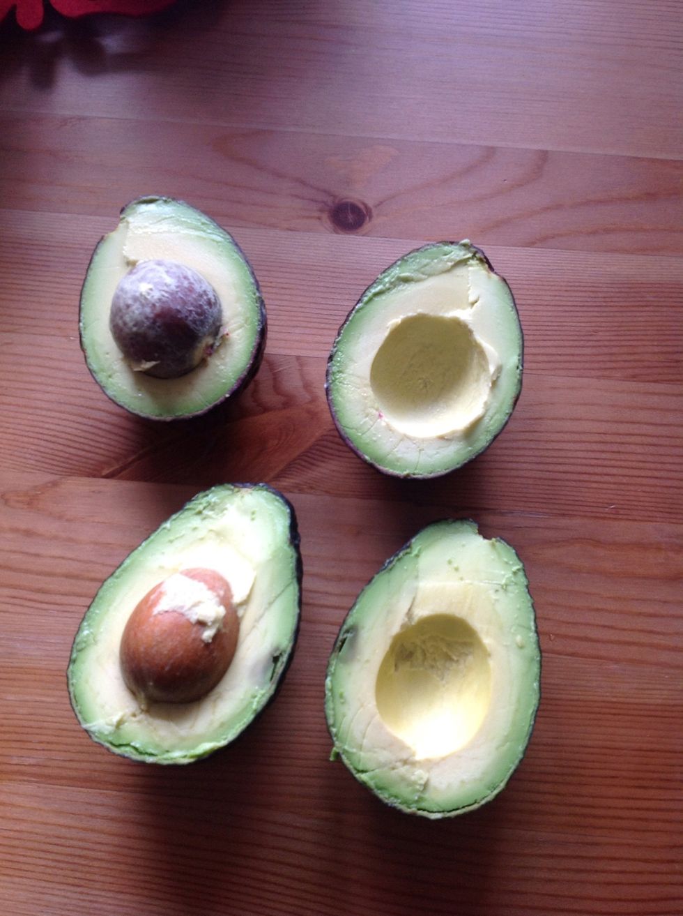 Cut the avacados into half