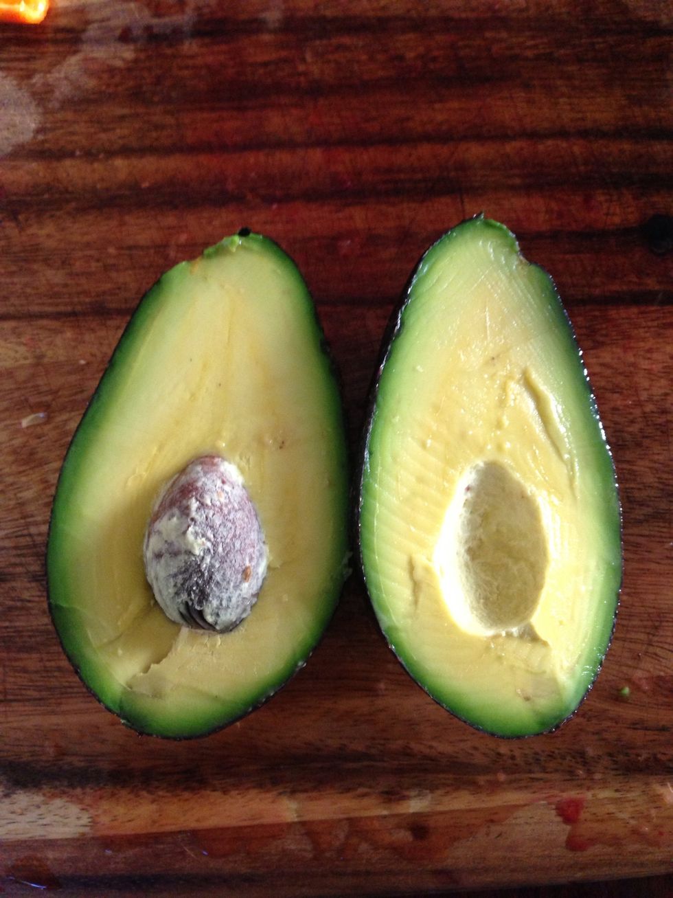 Cut the avocado up into roughly the same size as the smallest orange pieces.