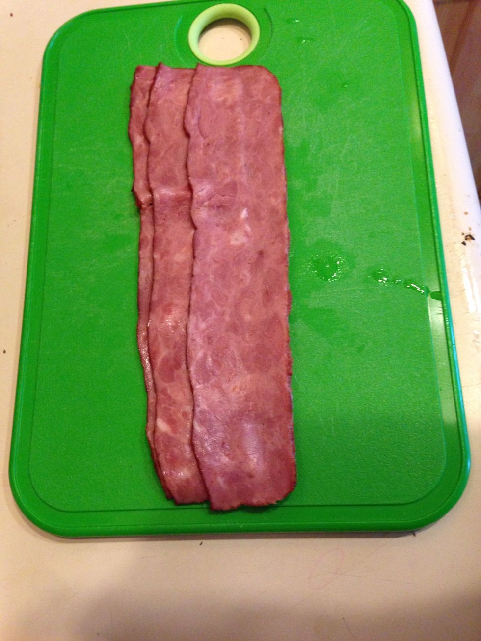 Cut the bacon into slices
