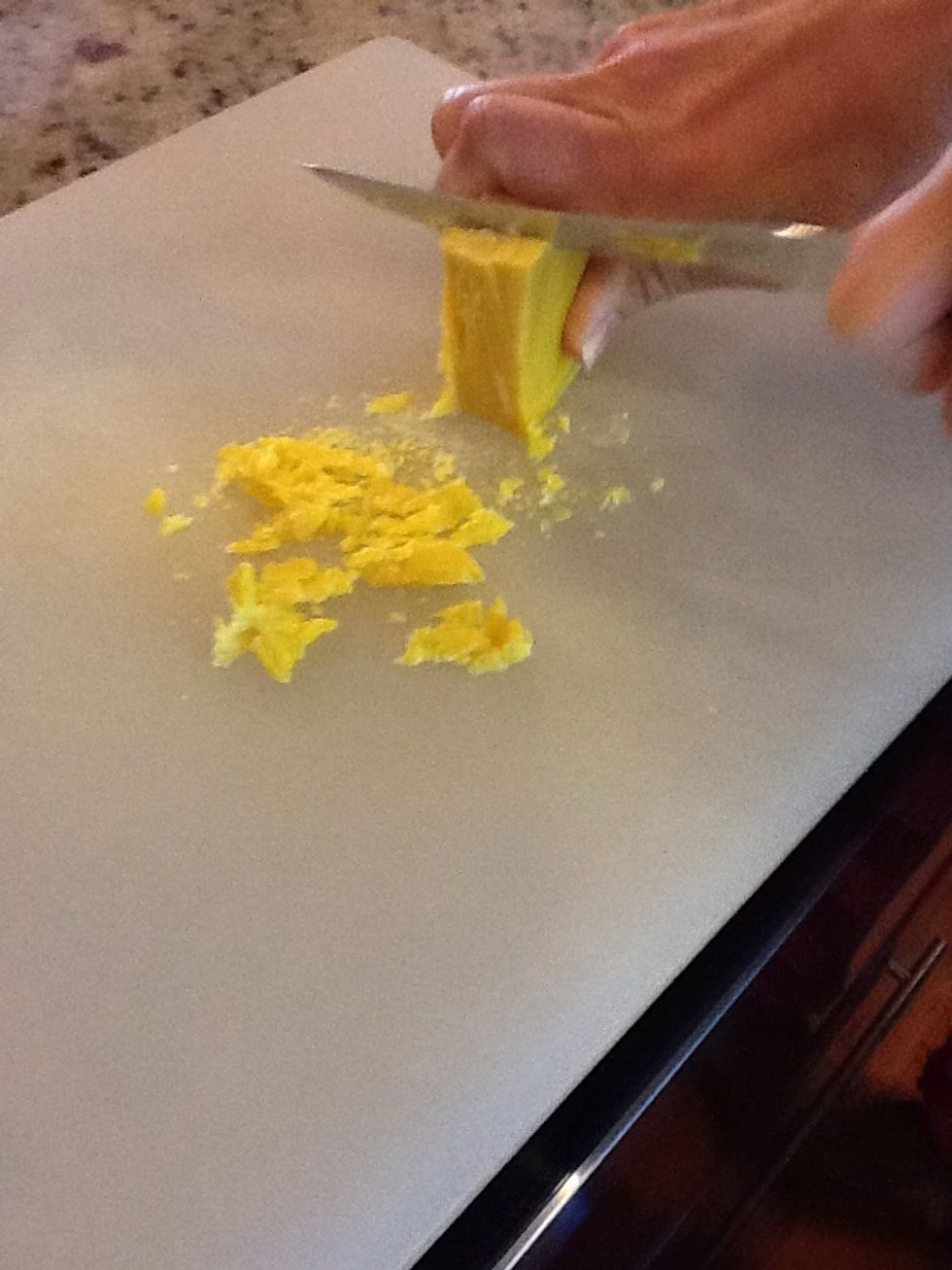 Cut the bar of Fels-Naptha in small chunks.